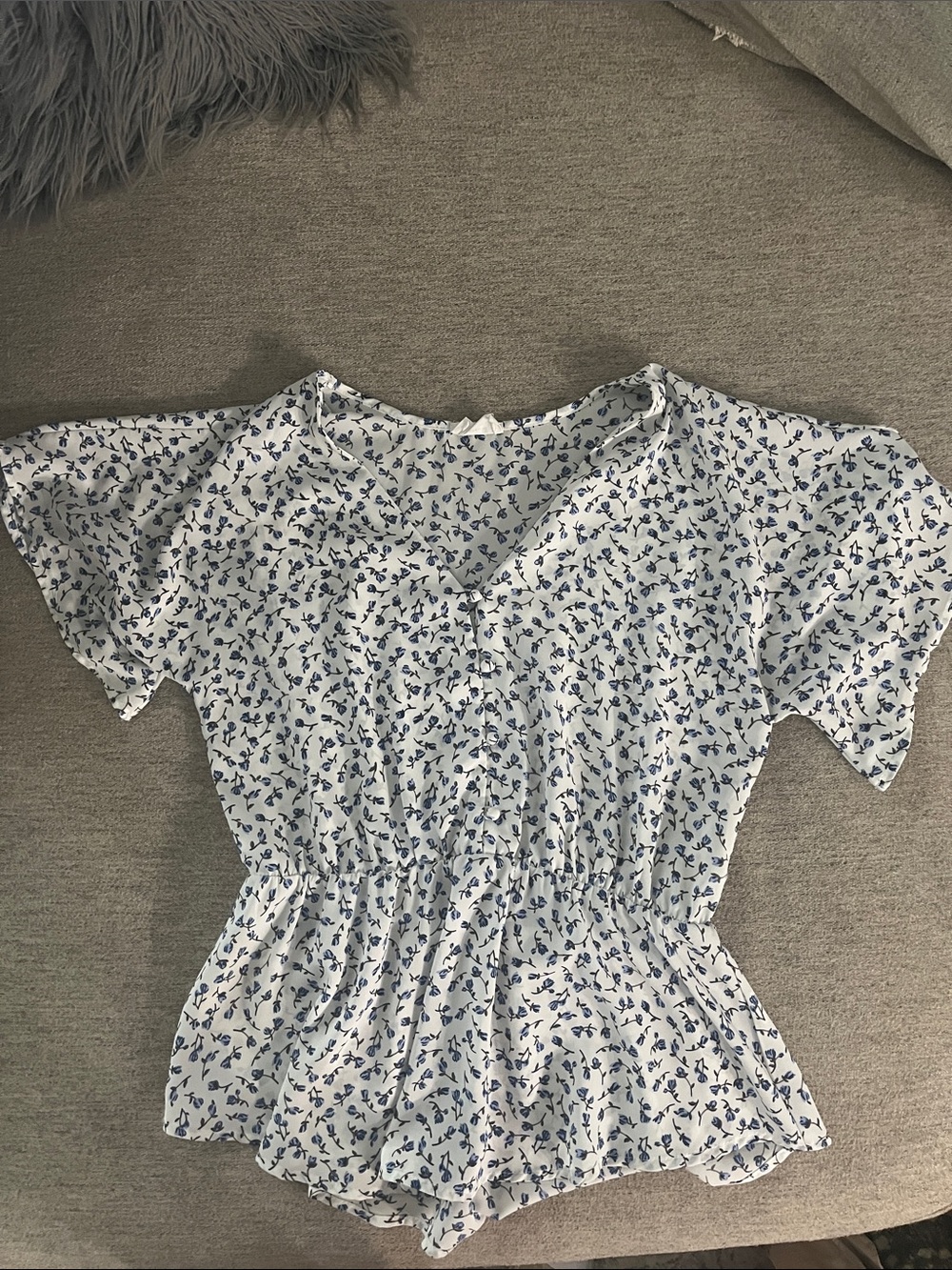 Sienna Sky White V-Neck Peplum Top with Blue Floral Print